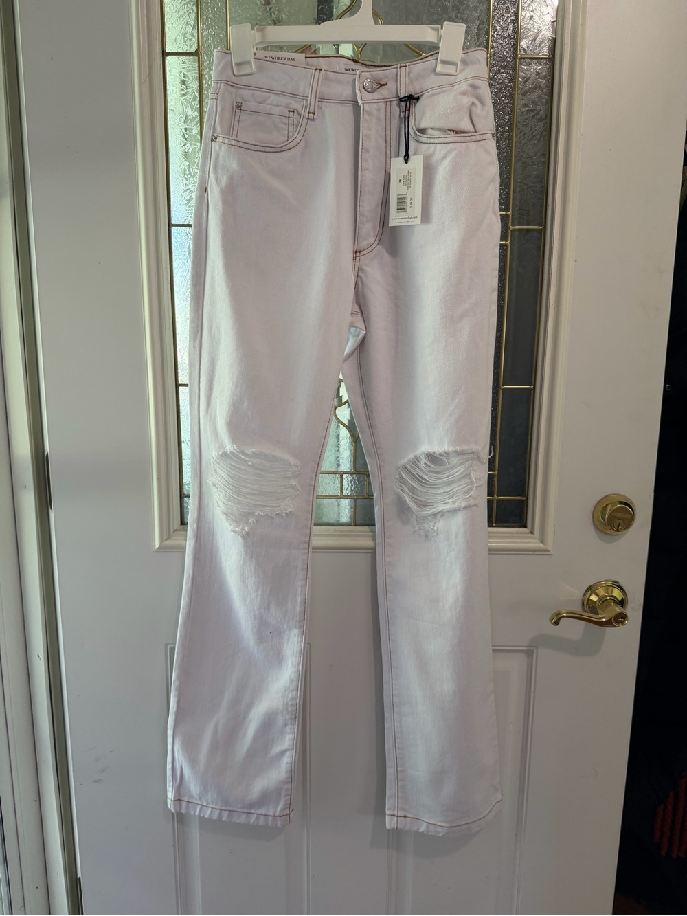 WeWoreWhat Pale Pink Flare Jeans with Distressed Knees